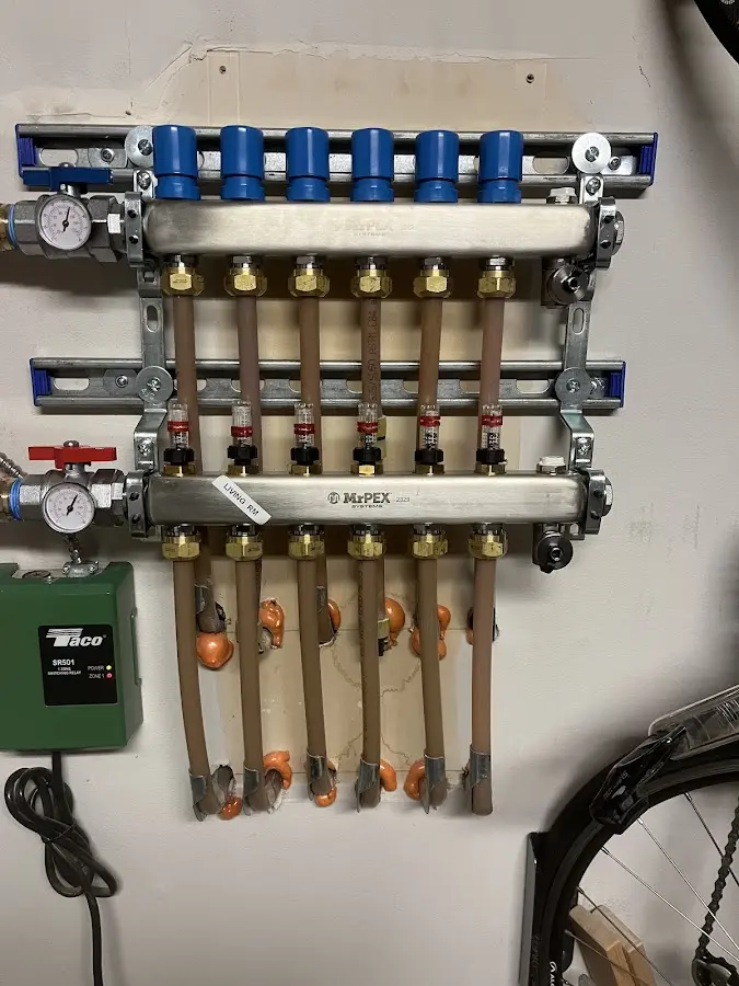 Plumber performing Water Heater Repair at a residential property in Easton